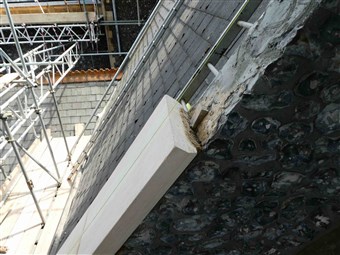 Repairs to the coping stones towards the top of the North Transept